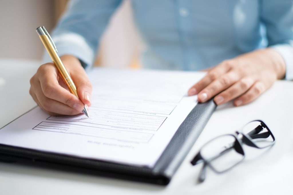 Man writing his document