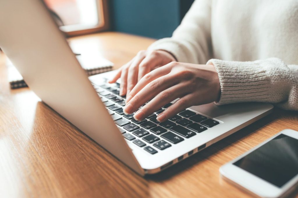 Woman logging in to website